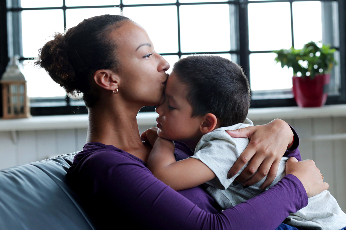 Image of a woman holding a child 