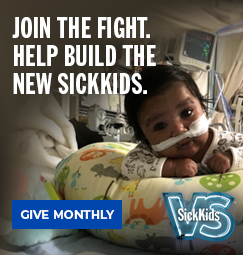 An infant lying on a pillow in a hospital room. The text reads, "Join the fight. Help build the new SickKids. Give monthly". The SickKids VS campaign logo is positioned in the bottom right corner of the image.