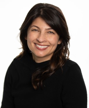 headshot of Dr. Eisha Christian smiling at the camera