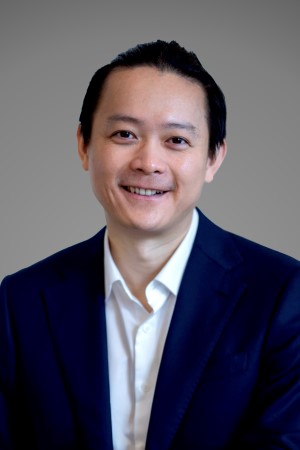 Headshot of Xi Huang