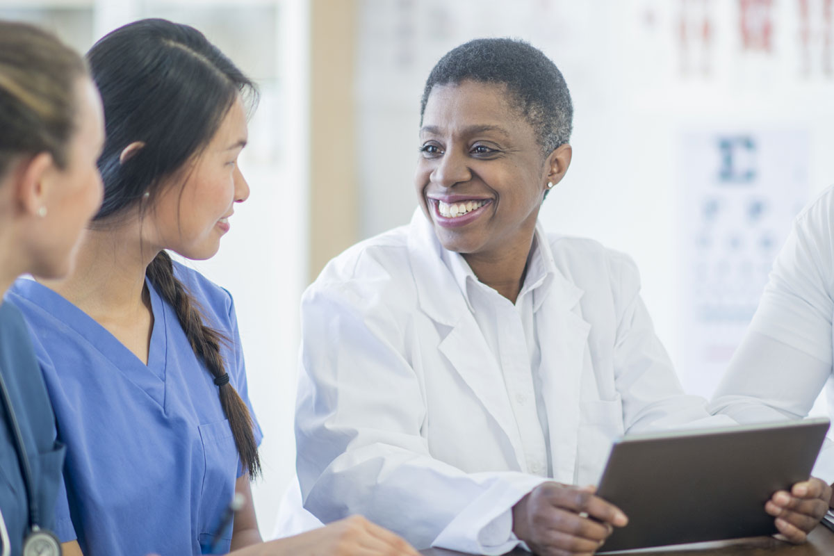 Health care providers in conversation.