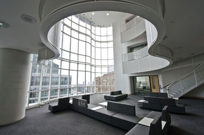 Interior view of atrium with swirling shaped balconies.
