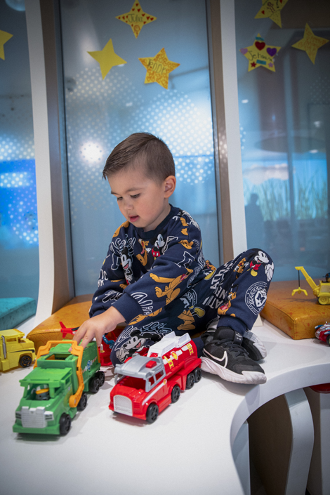 Jayden playing with trucks in the WAV PlayPark