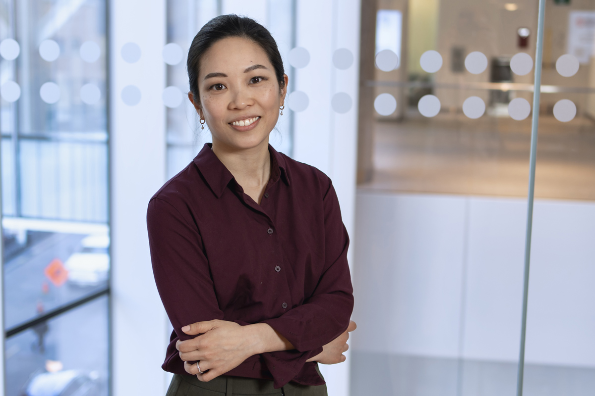 Dr. Jennifer Quon smiling and posing for a photo inside the Patient Support Centre.