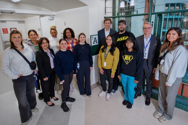 Members of SickKids' mental health leadership and front-line staff gather in celebration of the Schedule 1 designation.