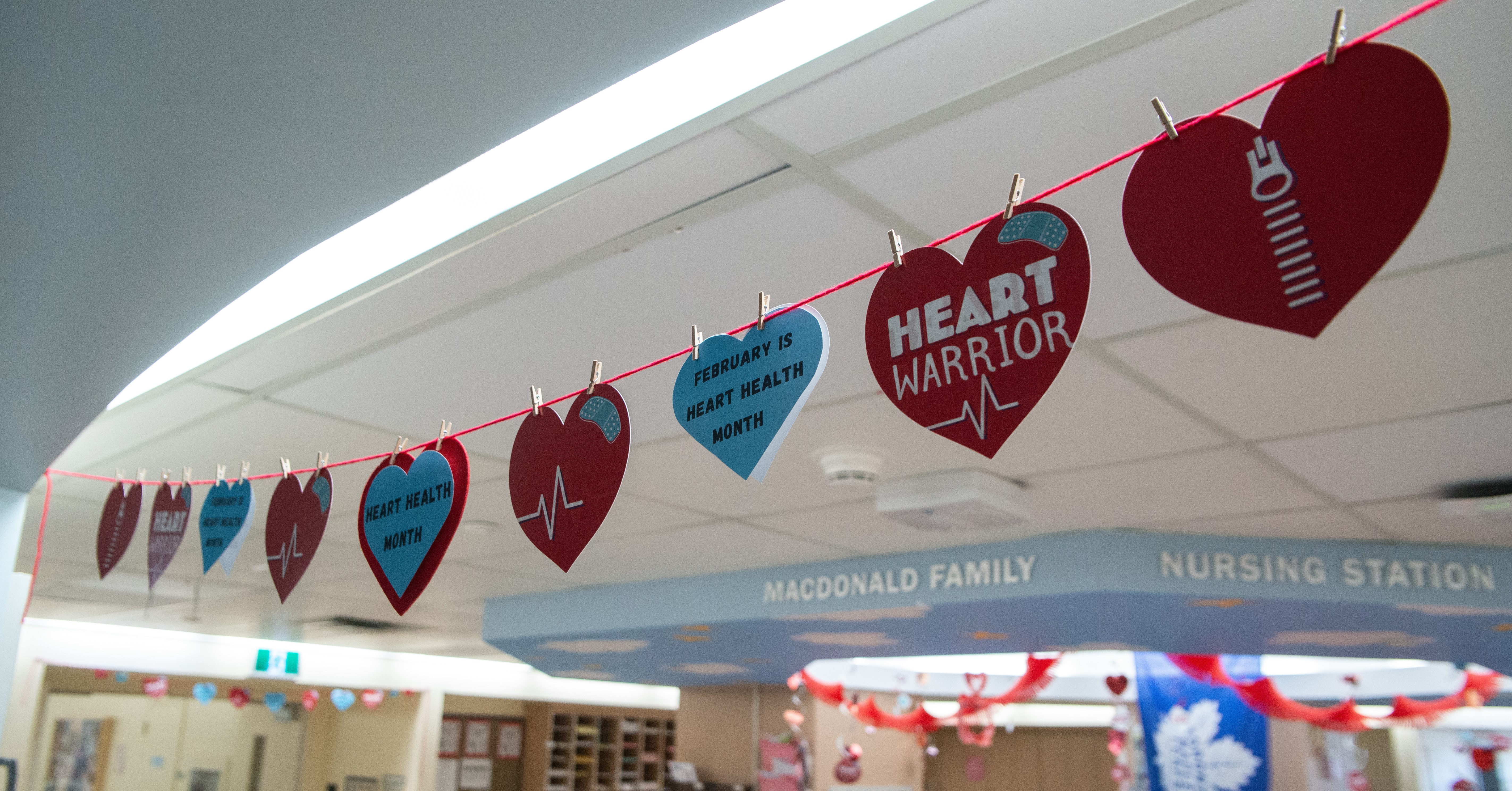 A banner of heart decorations hangs in SickKids' Cardiology unit.