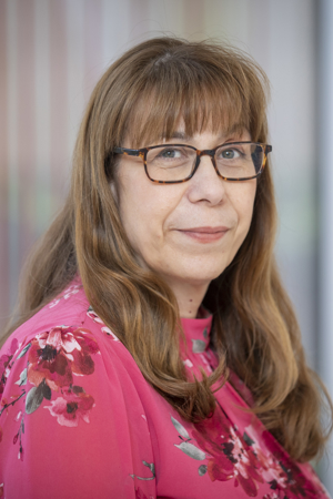headshot of Maria Pereira